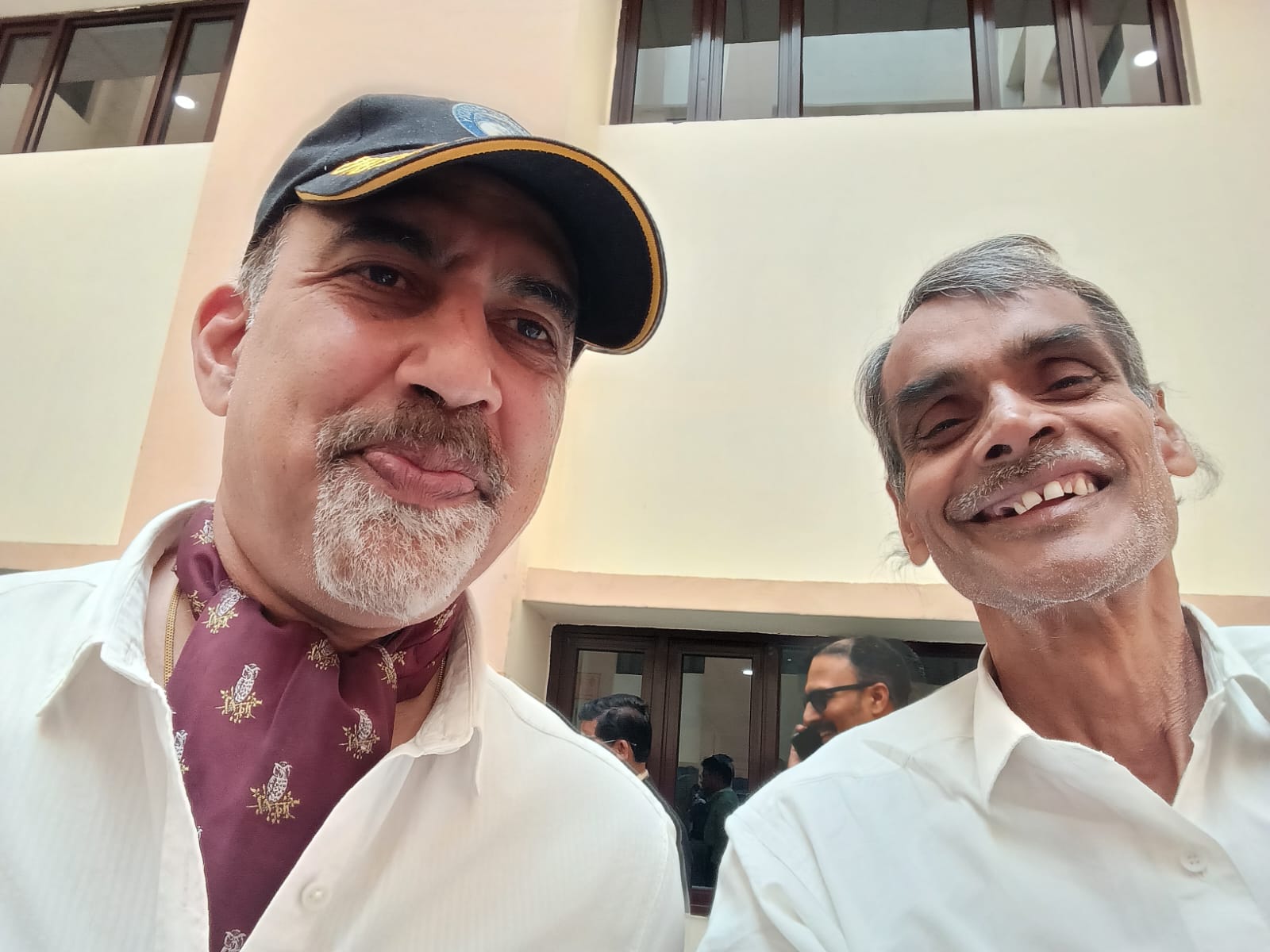 Founder with government official